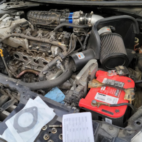 under the hood looking at an engine block